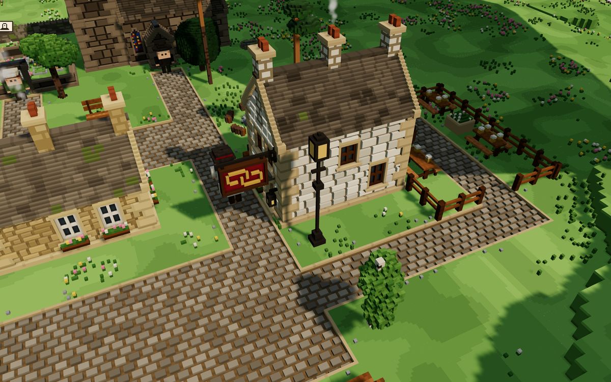A close view of the pub, a whitewashed stone house with a painted sign, a street lamp and a fenced beer garden, with townsfolk at the door